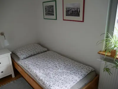 Ein Bett oder Betten in einem Zimmer der Unterkunft Irreler Mühle Ferienwohnungen und Ferienhäuser