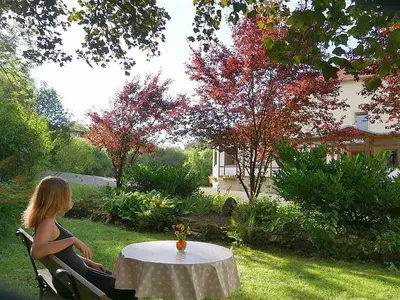Ein Garten an der Unterkunft Irreler Mühle Ferienwohnungen und Ferienhäuser