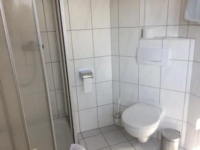 Ein Badezimmer in der Unterkunft Moselhotel Lesura