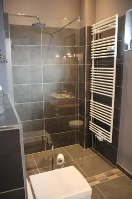 Ein Badezimmer in der Unterkunft Junior Suite The Backyard TBY 01