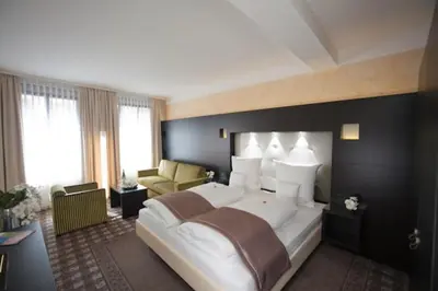 Ein Bett oder Betten in einem Zimmer der Unterkunft Weingut & Gästehaus Schmitz-Bergweiler