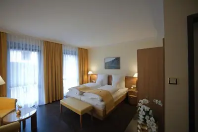 Ein Bett oder Betten in einem Zimmer der Unterkunft Weingut & Gästehaus Schmitz-Bergweiler