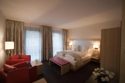 Ein Bett oder Betten in einem Zimmer der Unterkunft Weingut & Gästehaus Schmitz-Bergweiler