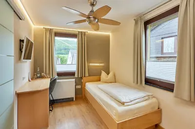 Ein Bett oder Betten in einem Zimmer der Unterkunft Hotel-Restaurant Ehses