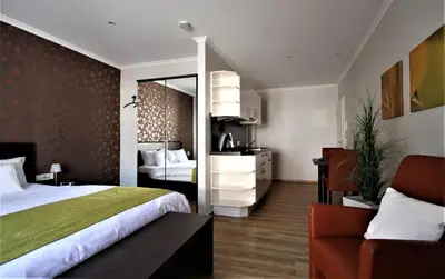 Ein Bett oder Betten in einem Zimmer der Unterkunft Feriendomizil am Lindenplatz