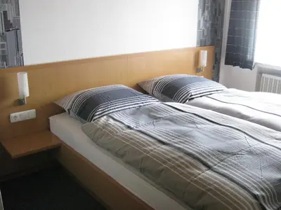 Ein Bett oder Betten in einem Zimmer der Unterkunft Gasthaus am Brunnen
