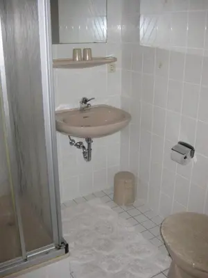 Ein Badezimmer in der Unterkunft Gasthaus am Brunnen