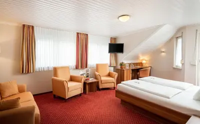 Ein Bett oder Betten in einem Zimmer der Unterkunft Hotel Pistono