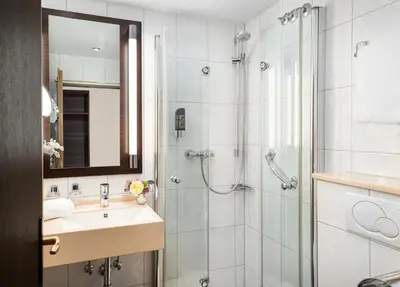 Ein Badezimmer in der Unterkunft Hotel Pistono