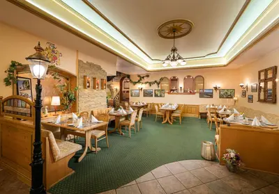 Ein Restaurant oder anderes Speiselokal in der Unterkunft Hotel Pistono