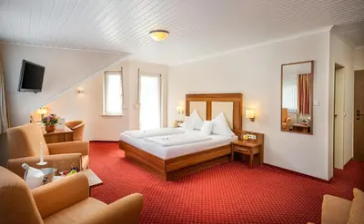 Ein Bett oder Betten in einem Zimmer der Unterkunft Hotel Pistono