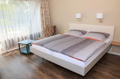 Ein Bett oder Betten in einem Zimmer der Unterkunft Hotel Zur Suhle
