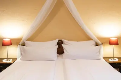 Ein Bett oder Betten in einem Zimmer der Unterkunft Hotel Weiler