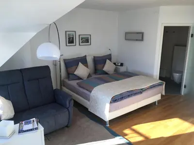 Ein Bett oder Betten in einem Zimmer der Unterkunft Gästehaus Weingut Meierer
