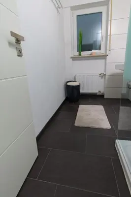 Ein Badezimmer in der Unterkunft Ferienwohnung T. Müllers | Nr. 2