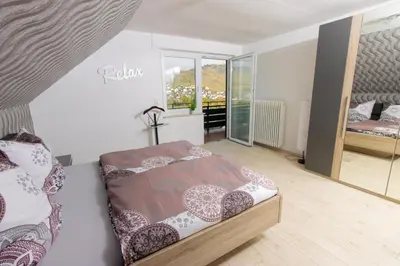 Ein Bett oder Betten in einem Zimmer der Unterkunft Ferienwohnung T. Müllers | Nr. 2