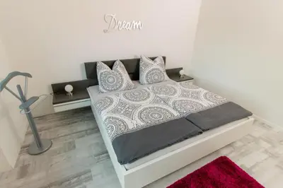 Ein Bett oder Betten in einem Zimmer der Unterkunft Ferienwohnung T. Müllers | Nr. 1