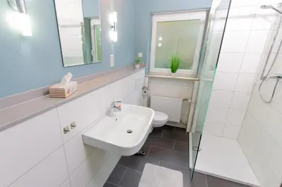 Ein Badezimmer in der Unterkunft Ferienwohnung T. Müllers | Nr. 1