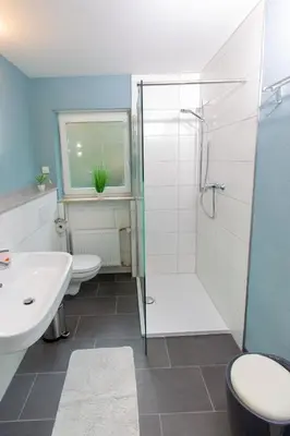 Ein Badezimmer in der Unterkunft Ferienwohnung T. Müllers | Nr. 1