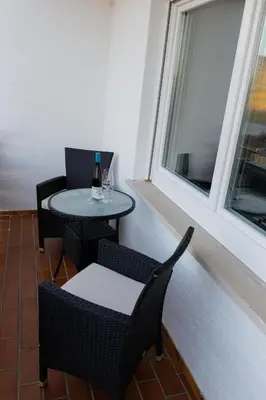 Ein Sitzbereich in der Unterkunft Ferienwohnung T. Müllers | Nr. 1