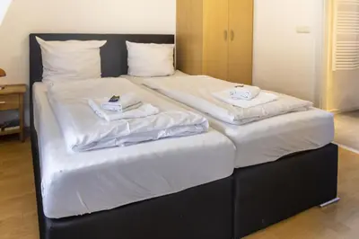 Ein Bett oder Betten in einem Zimmer der Unterkunft Ferienhaus Mosellage