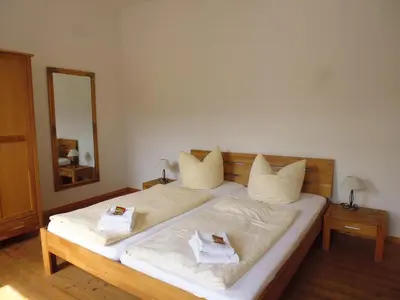 Ein Bett oder Betten in einem Zimmer der Unterkunft Ferienhaus Moselmerle