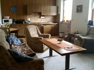 Ein Sitzbereich in der Unterkunft Ferienhaus Raabe