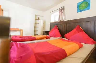 Ein Bett oder Betten in einem Zimmer der Unterkunft Nengshof Ferienwohnung Wildrose