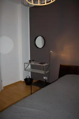 Ein Bett oder Betten in einem Zimmer der Unterkunft Casa Augusta - Urban Living
