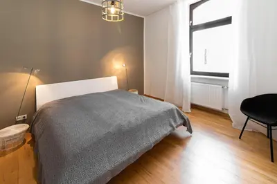 Ein Bett oder Betten in einem Zimmer der Unterkunft Casa Augusta - Urban Living