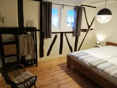 Ein Bett oder Betten in einem Zimmer der Unterkunft Ferienhaus Sosberg
