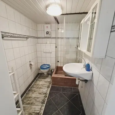 Ein Badezimmer in der Unterkunft Boardinghouse Leiwen 46