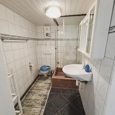 Ein Badezimmer in der Unterkunft Boardinghouse Leiwen 46