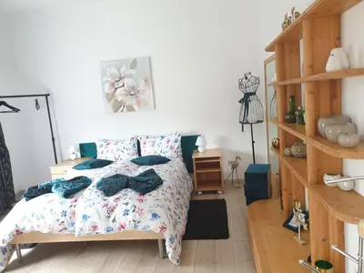 Ein Bett oder Betten in einem Zimmer der Unterkunft Marumparkblick 2 modern