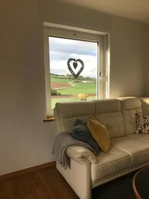 Ein Sitzbereich in der Unterkunft Ferienhaus Auf der Hill