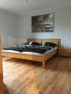 Ein Bett oder Betten in einem Zimmer der Unterkunft Ferienhaus Auf der Hill