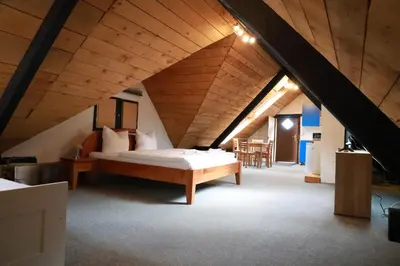 Ein Bett oder Betten in einem Zimmer der Unterkunft Beim Heines