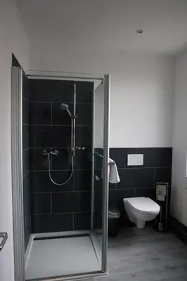 Ein Badezimmer in der Unterkunft Beim Heines