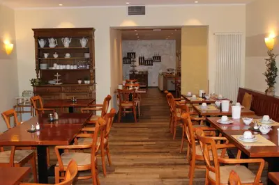 Ein Restaurant oder anderes Speiselokal in der Unterkunft Hotel Bitburger Hof