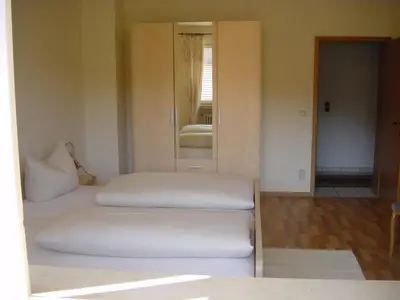 Ein Bett oder Betten in einem Zimmer der Unterkunft Landgasthof Schuck