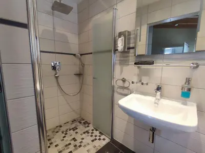 Ein Badezimmer in der Unterkunft Gästehaus im Alten Fährhaus