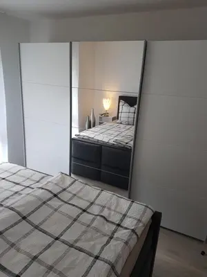 Ein Bett oder Betten in einem Zimmer der Unterkunft Ferienwohnung Moritz