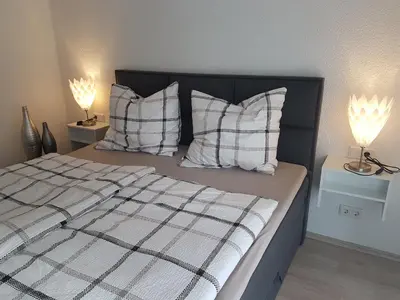 Ein Bett oder Betten in einem Zimmer der Unterkunft Ferienwohnung Moritz