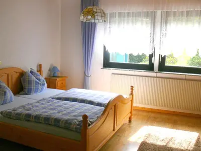 Ein Bett oder Betten in einem Zimmer der Unterkunft Apartments Monika Schneider