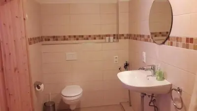 Ein Badezimmer in der Unterkunft Neumühle