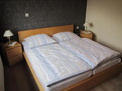 Ein Bett oder Betten in einem Zimmer der Unterkunft 