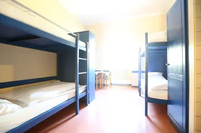 Ein Bett oder Betten in einem Zimmer der Unterkunft Kolping Hostel Trier im Warsberger Hof