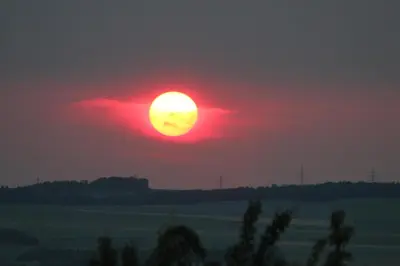 Blick auf den Sonnenuntergang/Sonnenaufgang von der Ferienwohnung aus oder aus der Nähe