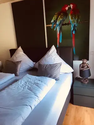 Ein Bett oder Betten in einem Zimmer der Unterkunft IchZeit Aparthotel