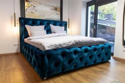Ein Bett oder Betten in einem Zimmer der Unterkunft IchZeit Aparthotel